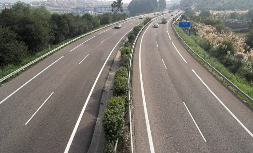 Busy motorway with two lanes in each way.