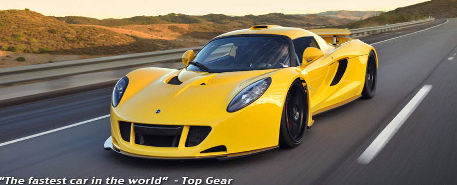 Hennessey Venom GT speeding on highway with phrase
