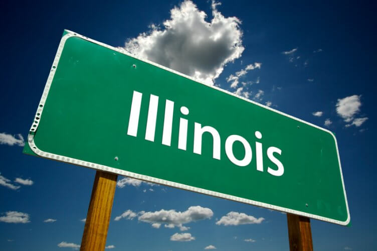 Illinois Road Sign with cloudy blue sky as background