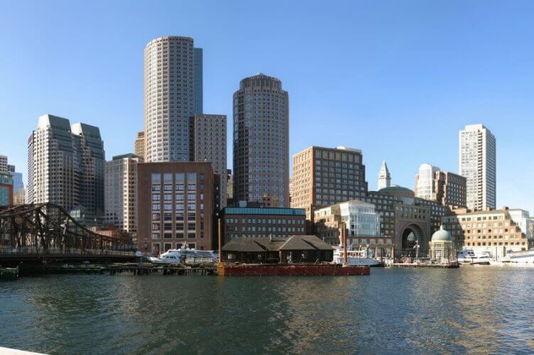 Skyline of Boston, Massachusetts including the northern avenue bridge and the river