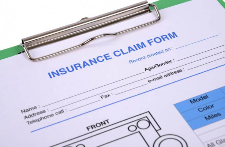 Close up to a Car Insurance Claim Form to to depict mistakes to avoid on your car insurance claim
