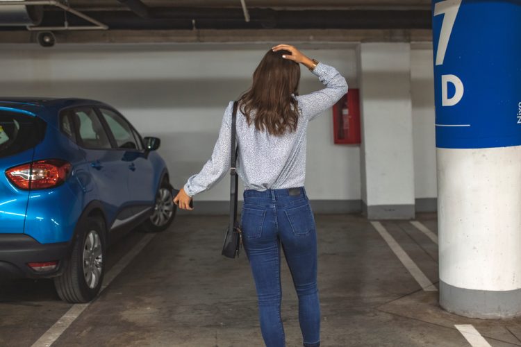 woman finds her car stolen in parking garage