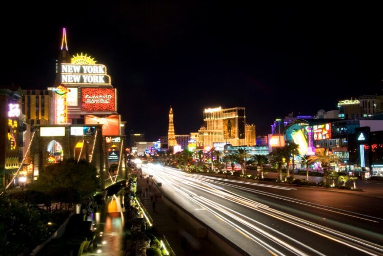 Cars in Vegas at night. Only their moving lights were captured by the camera.