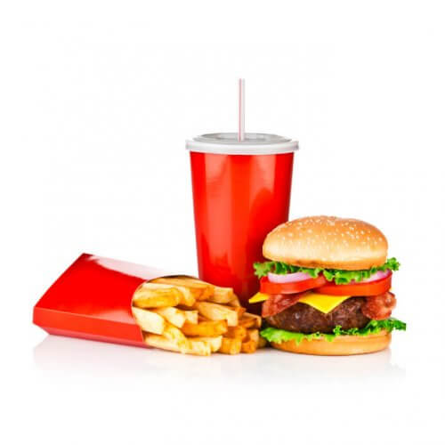 Fast food meal: cheeseburger, cup of soda and french fries.