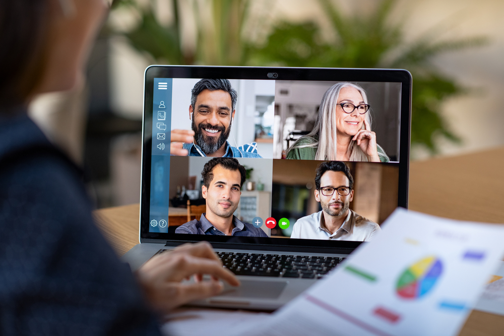 Businesswoman has meeting when working from home with multi-ethnic team 