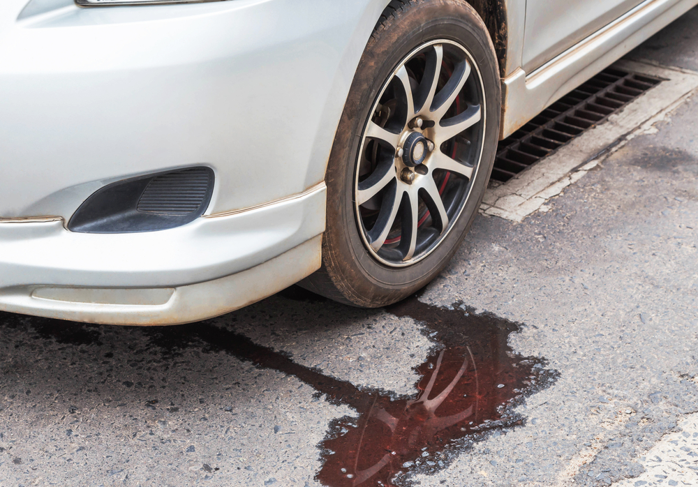 Reddish fluid leaking from car