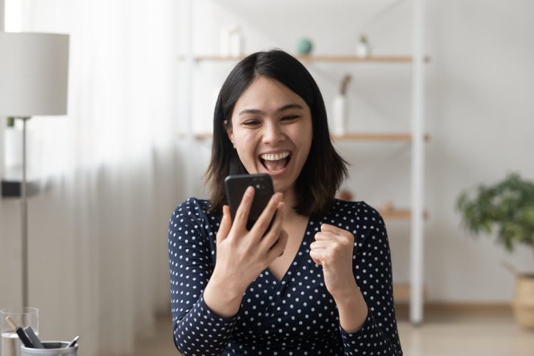 Happy woman gets best deal on car insurance