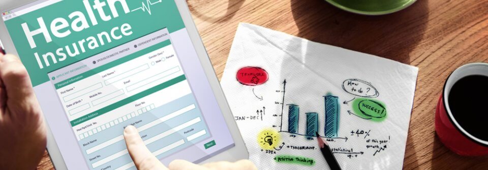 Close up of to health insurance application on a tablet device and illustrating 10 questions to ask when choosing a health insurance plan.