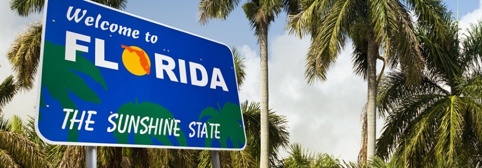 A road sign that reads Welcome to Florida to illustrate the car insurance requirements for that state.