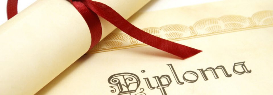 Close up to a diploma to illustrate how your diploma affects your auto-insurance.