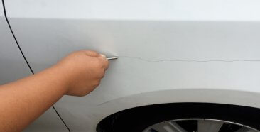 Image of Someone Keyed My Car. Will Insurance Cover the Cost to Fix It?