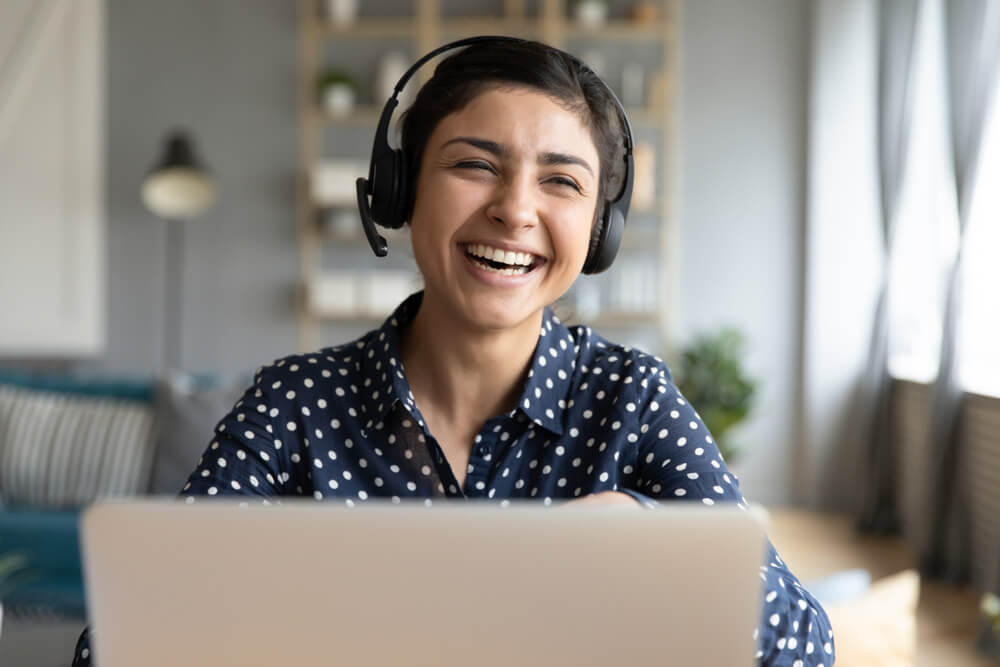 woman playing online games with family during coronavirus