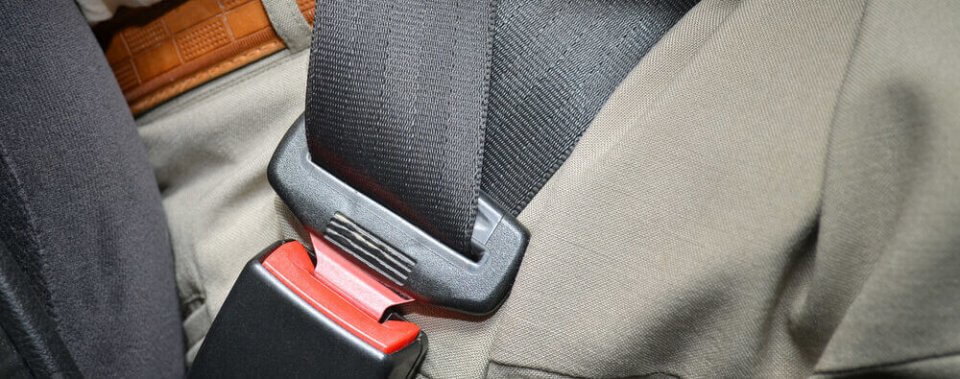 fastened seat belt on car