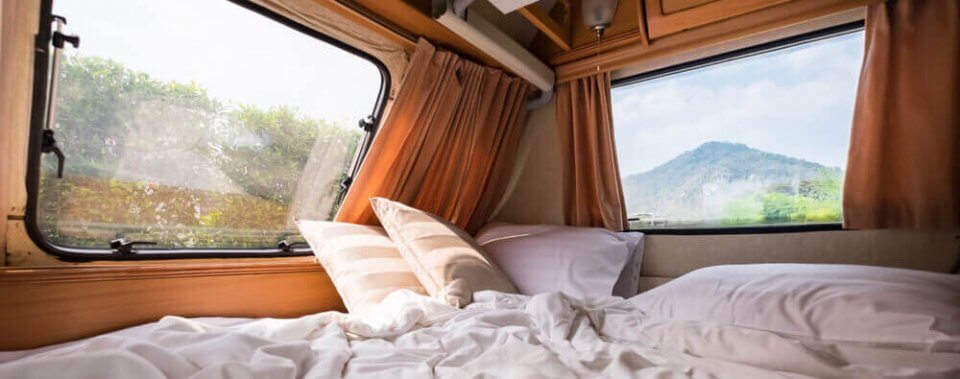 inside view of the bedroom of a school bus house