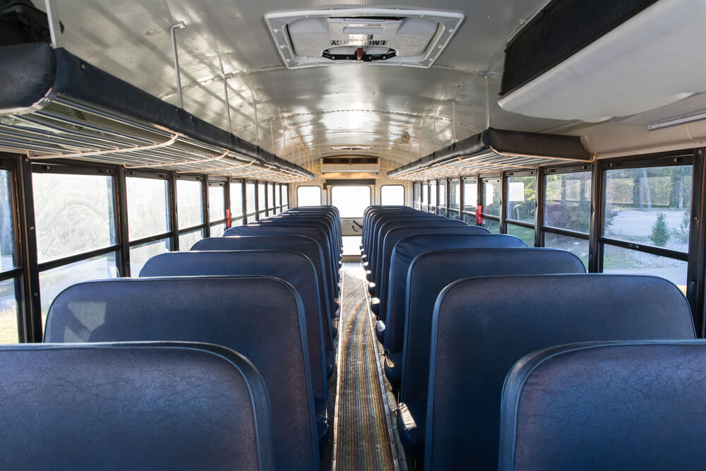 inside view of a school bus about to be converted to a home