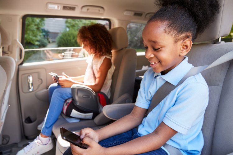 children in car with booster seat