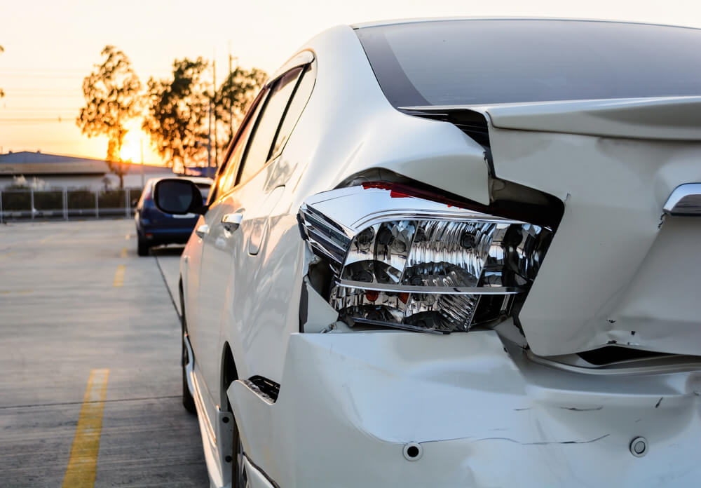 closeup view of the back of a crashed car