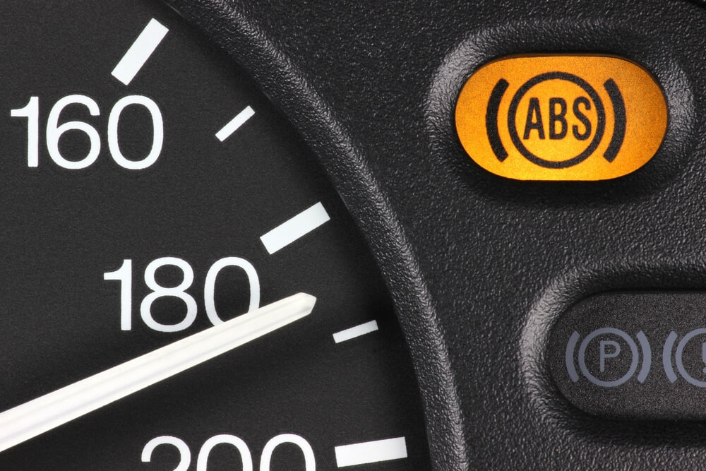 closeup of a car dashboard with antilock brake system auto safety feature