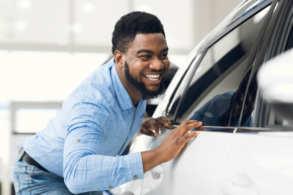 african american male buying new car