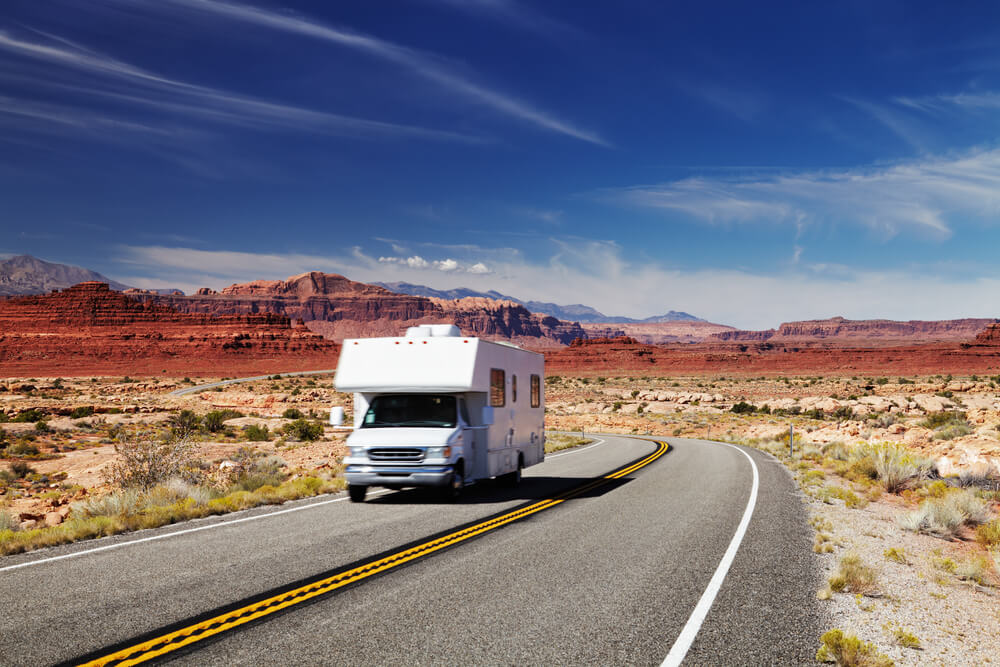 motorhome traveling on two lane highway