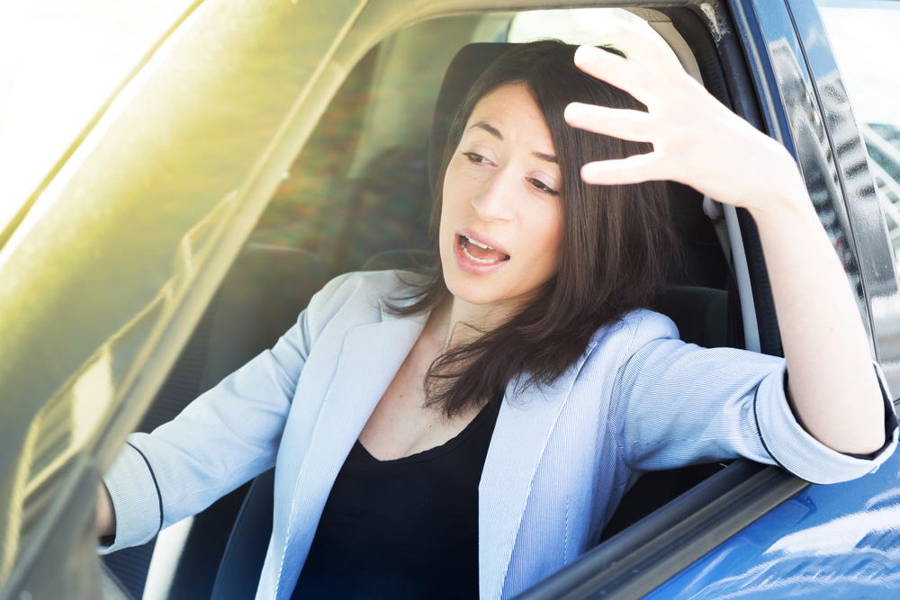 Angry woman stuck in traffic