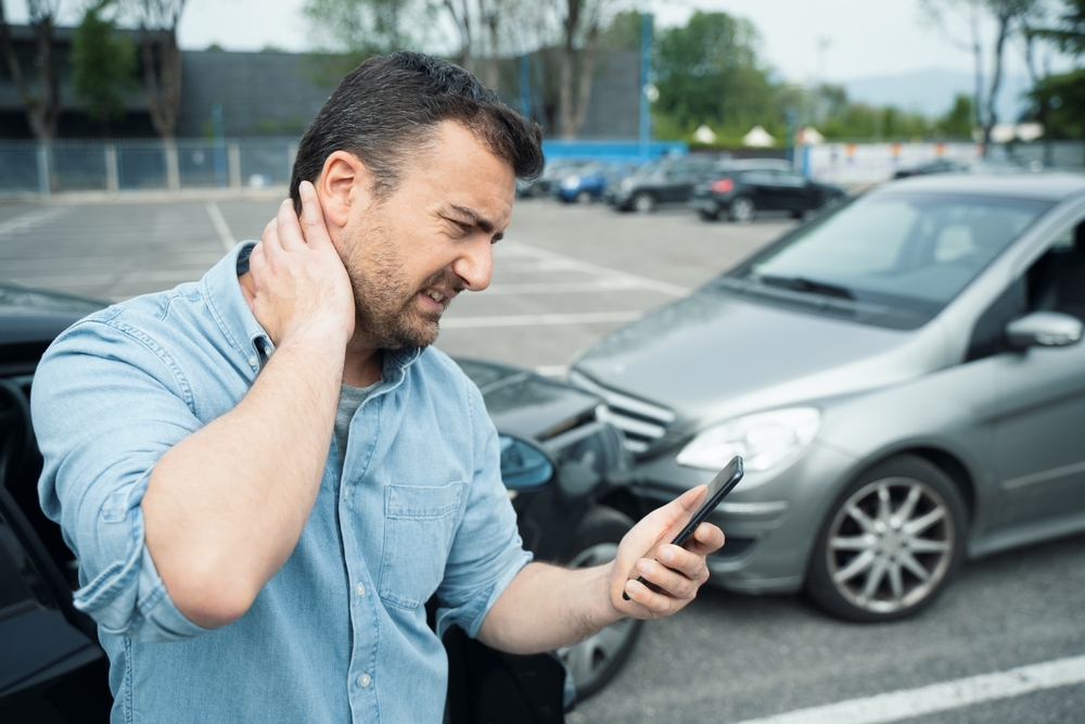 Man with hurt neck after car accident