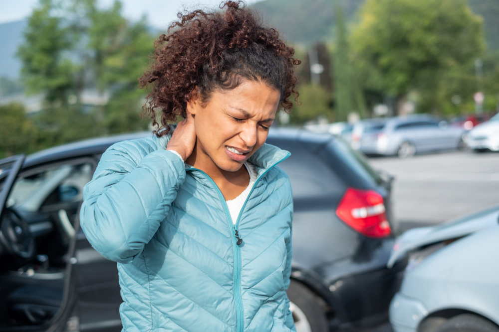 woman with hurt neck after car accident