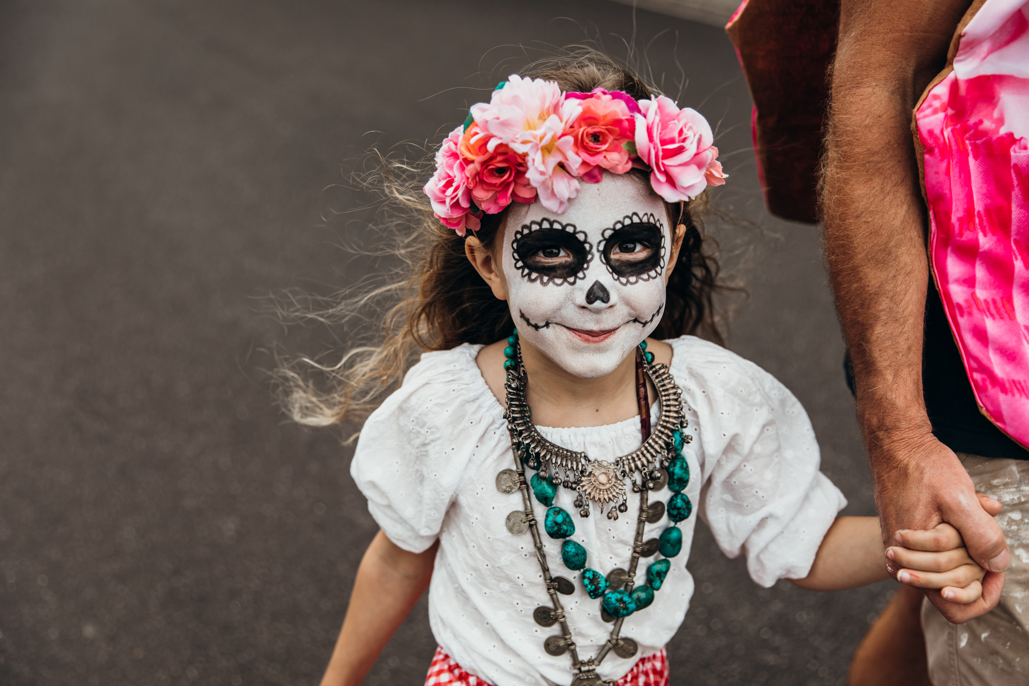 Young girl celebrates Dia de los Muertas