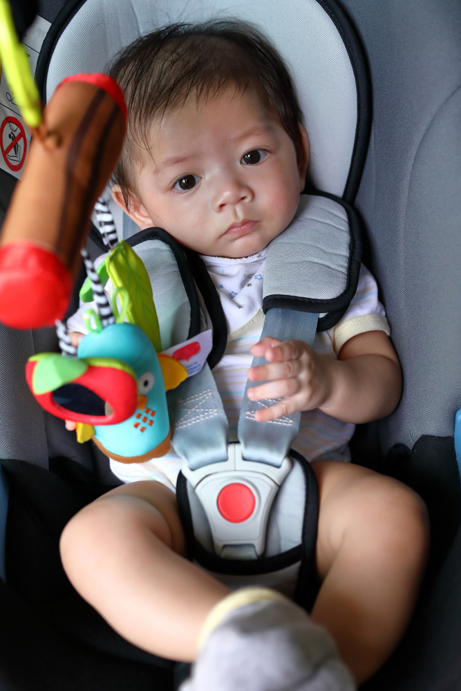 Cute baby in car seat