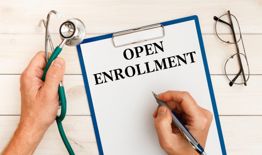 open enrollment form on clipboard