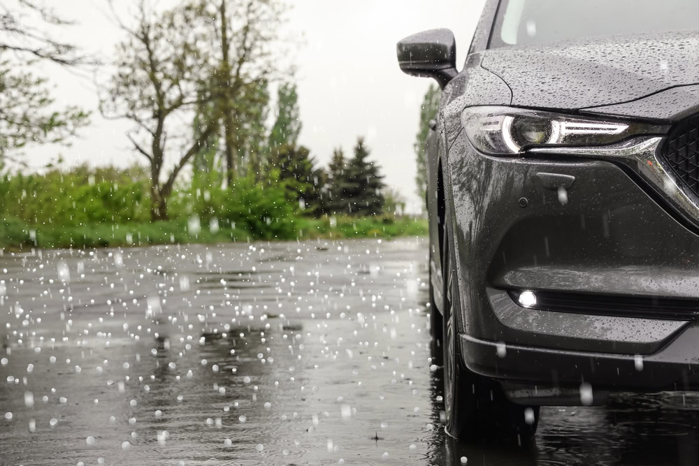 Car in a hail storm - cheap car insurance.