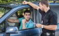 Man talks with police officer.