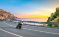 Driver heading out for a summer ride with motorcycle insurance from Freeway.