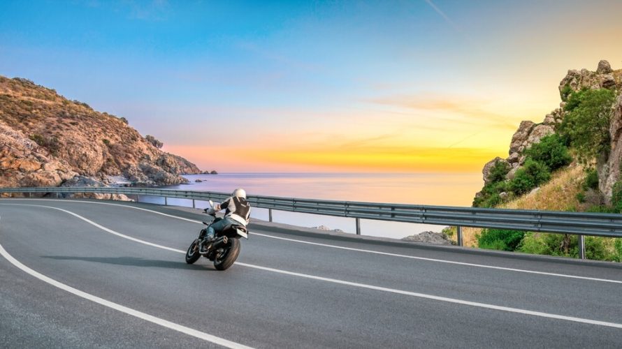 Driver heading out for a summer ride with motorcycle insurance from Freeway.