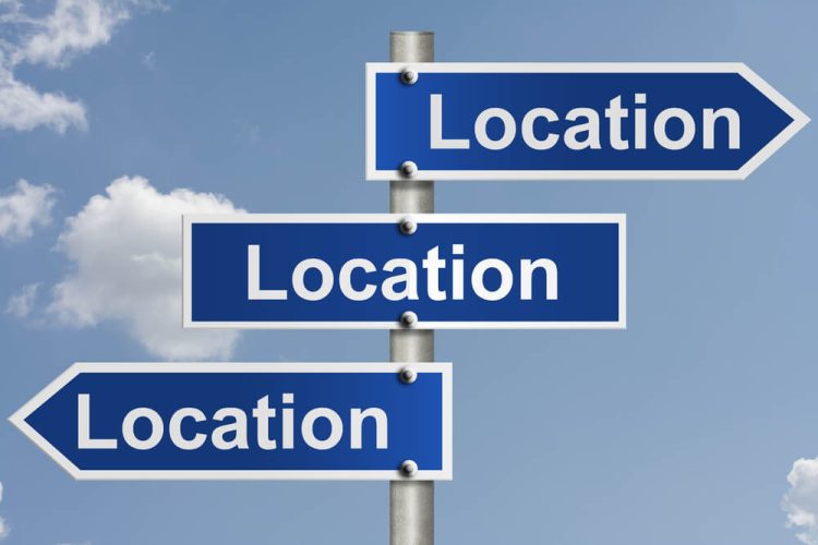 Three signs that say 