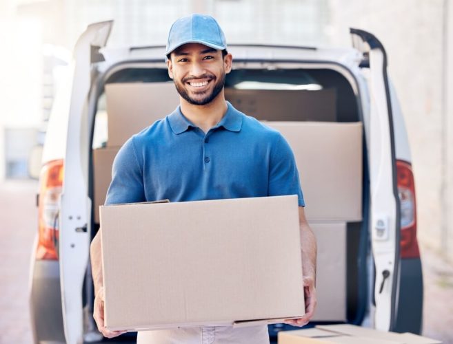 Portrait, parcel and delivery man with box in outdoor for shipping, courier service or stock. Cargo, logistics and employee with cardboard package for export, distribution or commercial supplier, need for cheap commercial vehicle insurance.
