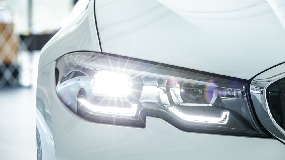Close-up of a modern LED car headlight, exploring the question are LED headlights better than traditional bulbs.