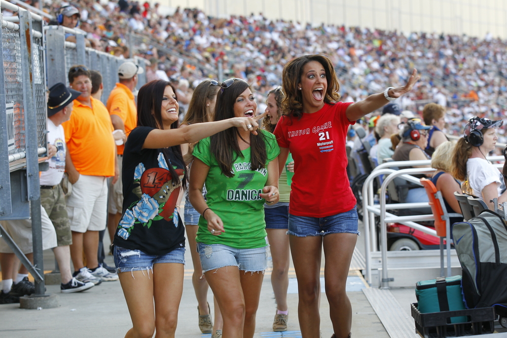 NASCAR fans show their support for their favorite team during the Coca-Cola 600 race at the Charlotte Motor Speedway in Concord, NC.