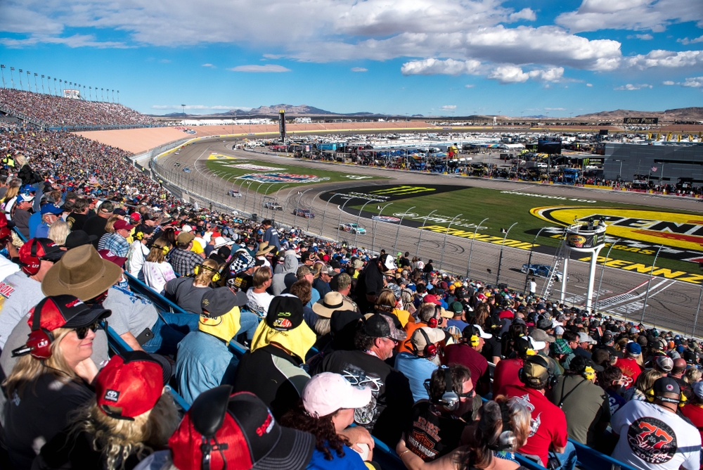 Race fans in the grandstand at the NASCAR Monster Energy Cup Series Pennzoil 400 race at Las Vegas Motorspeedway in Las Vegas on March 04, 2018.