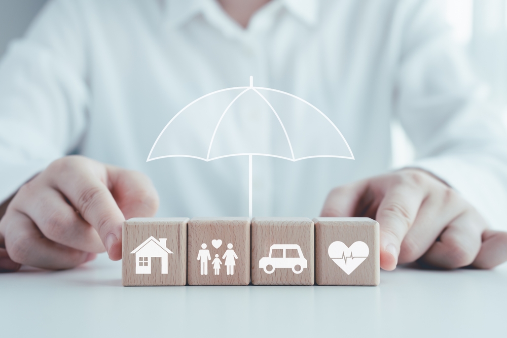 Insurance coverage concept featuring home, family, auto, and health protection.
