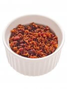 close up of a bowl of bacon bits isolated