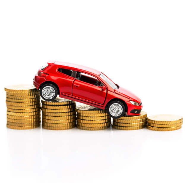 Miniature car driving down a set of decreasing stacks of coins.