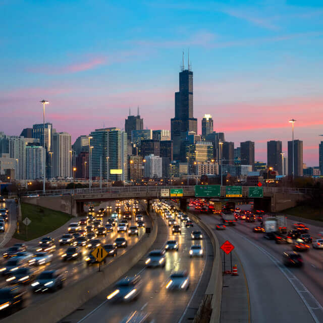 Chicago skyline and freeway at night