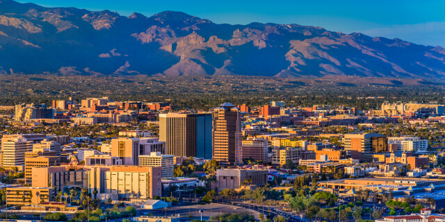 Tucson Arizona skyline and Santa Catalina Mountains at dusk.