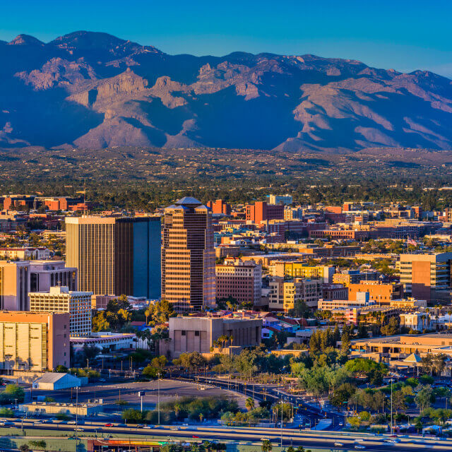 Tucson Arizona skyline and Santa Catalina Mountains at dusk.