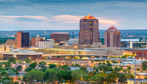 Panoramical view of Albuquerque city in the afternoon with many buildings and trees