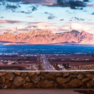 Panoramical view of Las Cruces city in the morning and a group of mountains in the background
