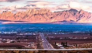 Panoramical view of Las Cruces city in the morning and a group of mountains in the background