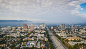 Downtown Glendale at dusk with glendale mountains in the background