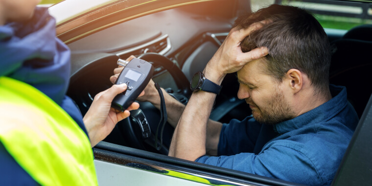 Man inside car DUI detained by cops